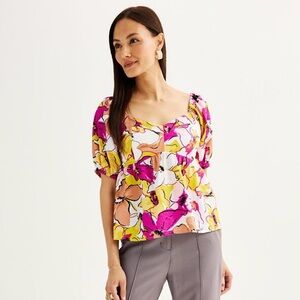 Nine West Colorful babydoll top with a white, yellow, and purple floral print